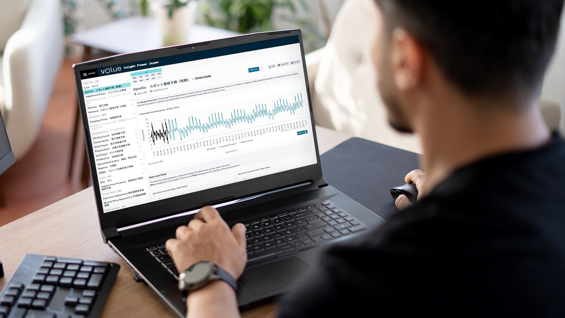 Trader in front of a screen showing Volue's SpotEx page